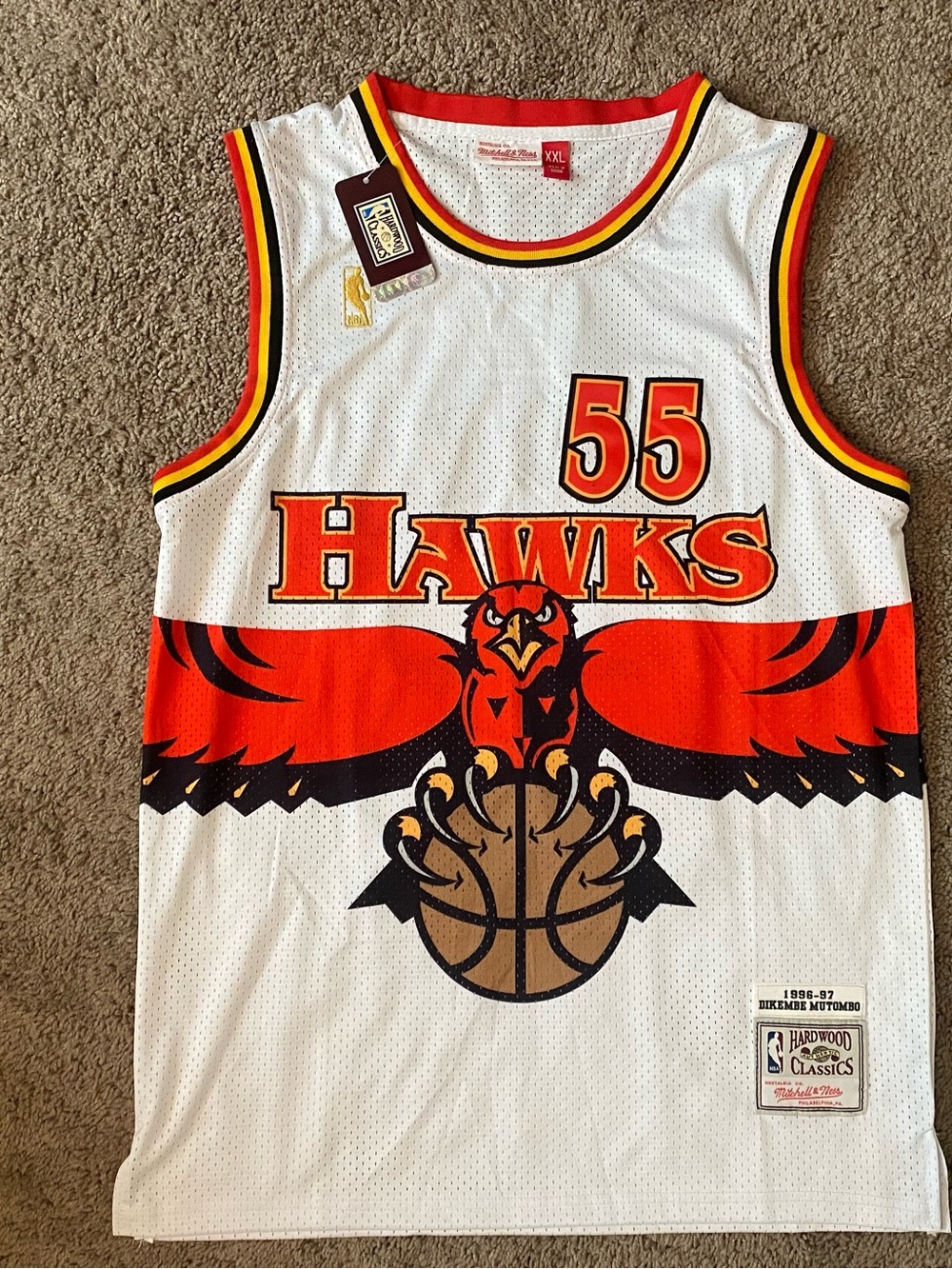 Dikembe Mutombo Mitchell & Ness White Jersey with Red, Yellow and Black Trim